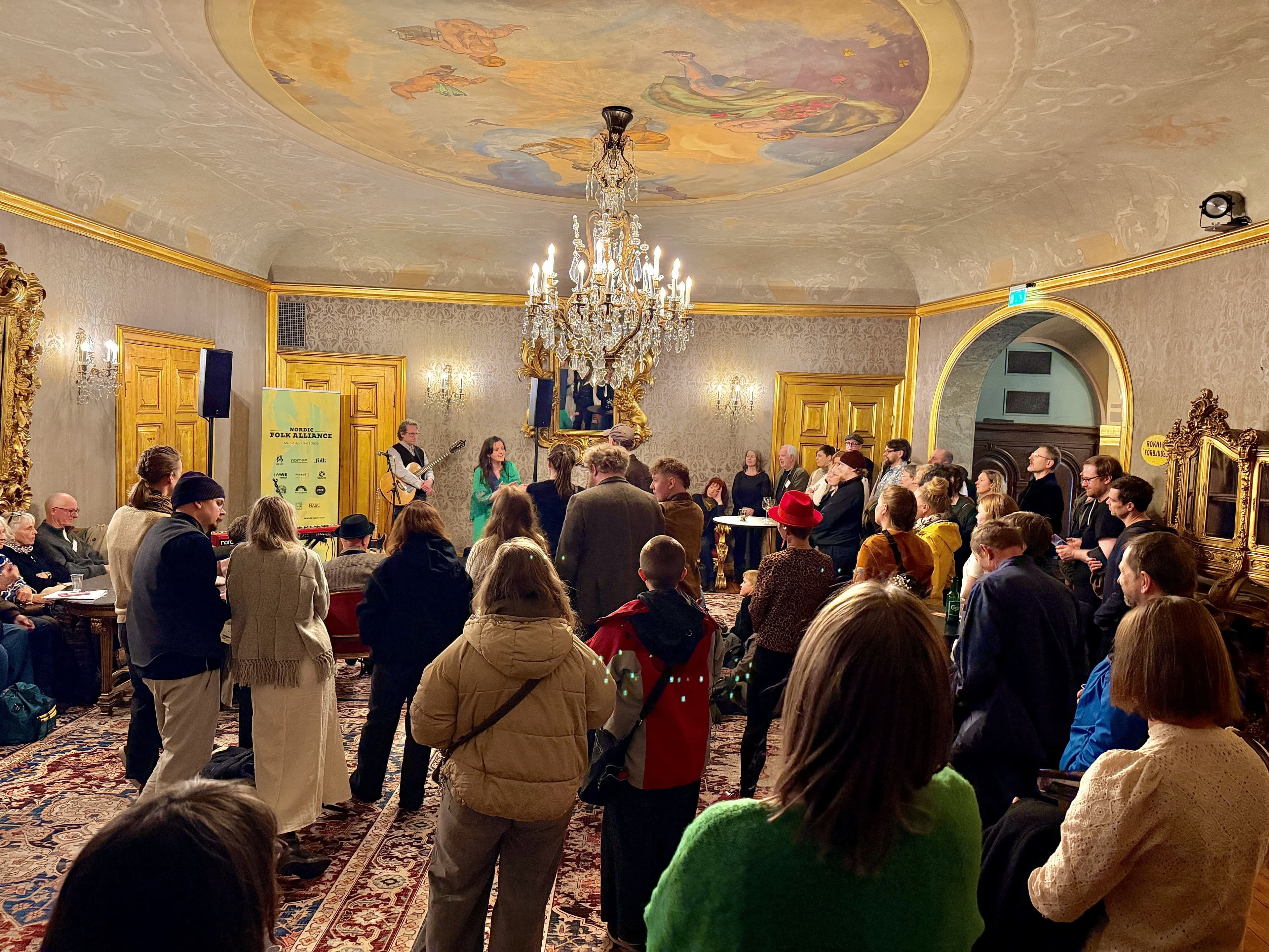 Reception in The Gold Foyer with live music beneath the crystal chandelier